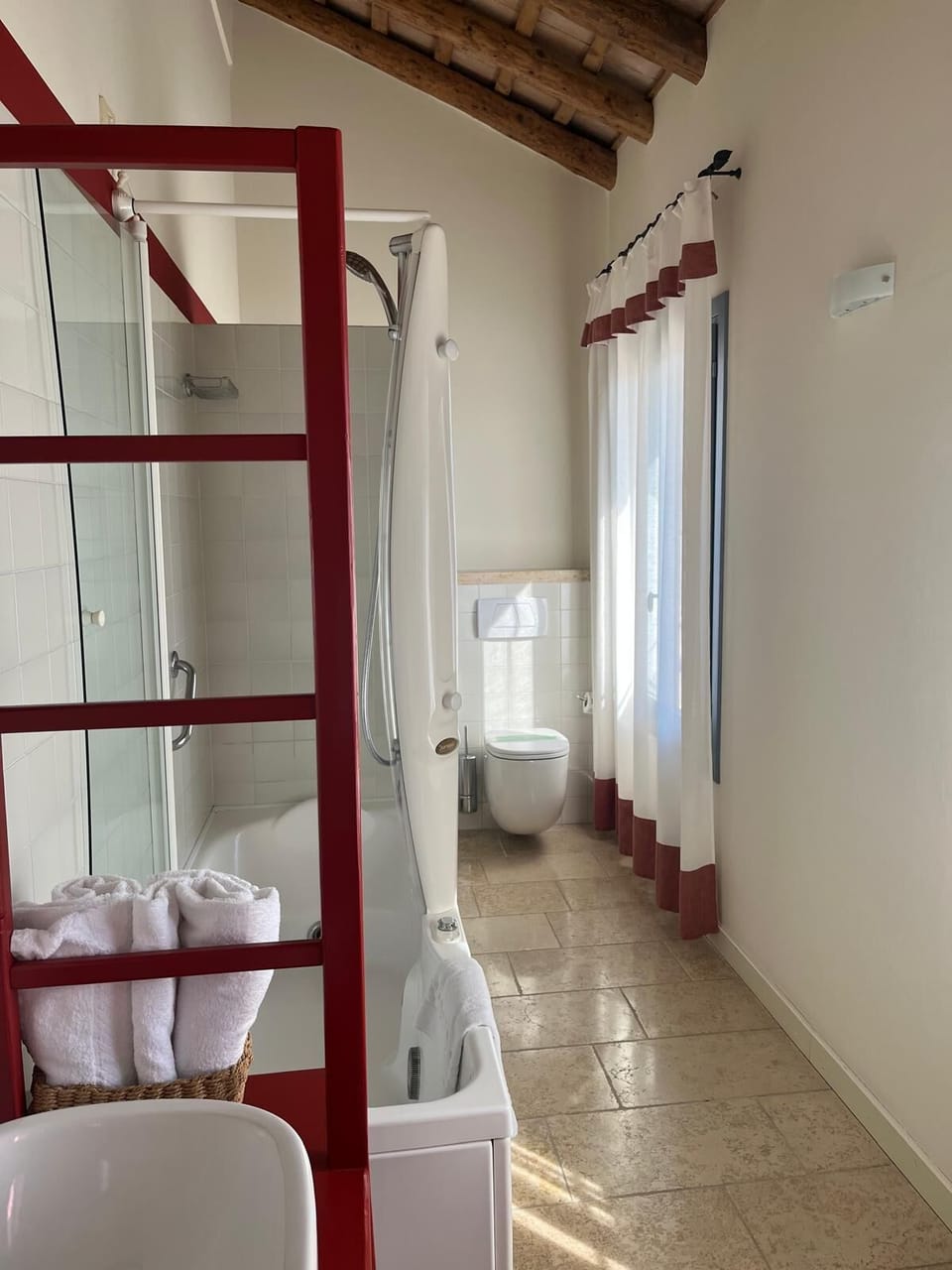 Hair dryer, slippers, bidet, towels
