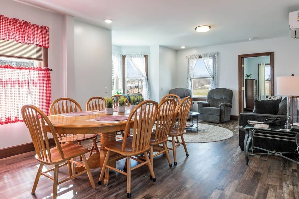 Unwind in the heart of the home, where the living and dining areas merge seamlessly for a cozy and welcoming atmosphere