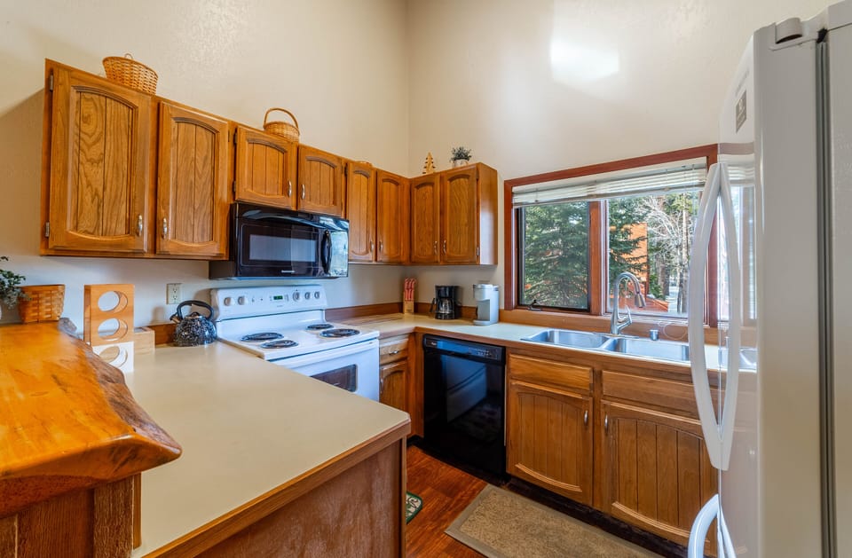 Kitchen comes fully stocked with everything needed to cook a delicious meal.