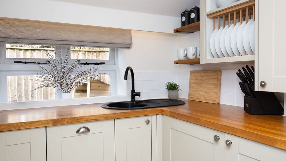 Whether you're whipping up a hearty breakfast or a romantic supper, this kitchen offers everything you need.
