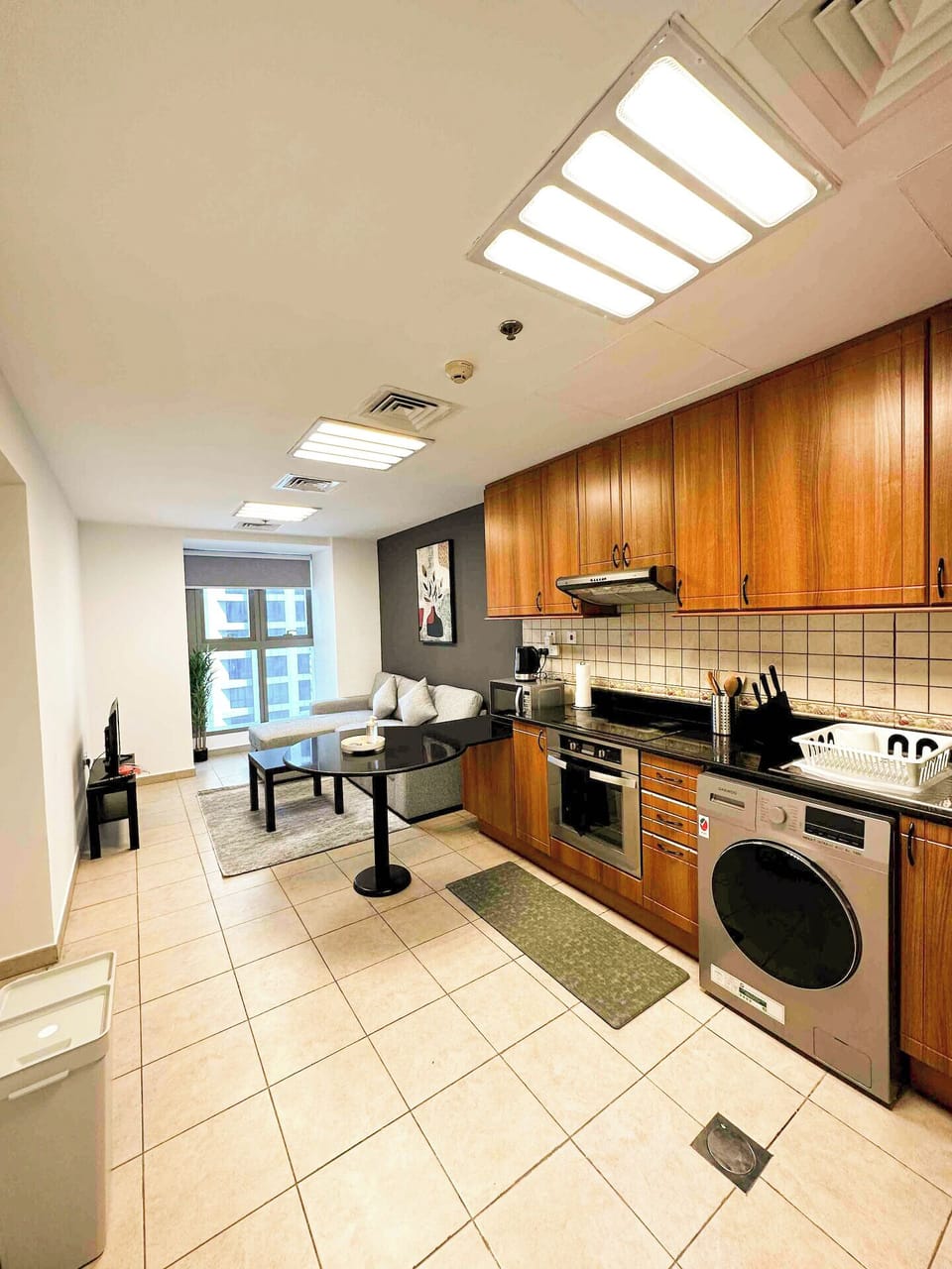 Deluxe Apartment, Marina View | Private kitchen | Microwave, oven, stovetop, coffee/tea maker