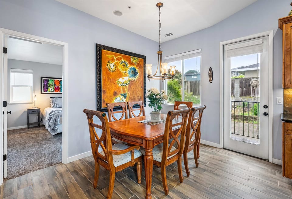 Elegant dining area with a spacious table for 6