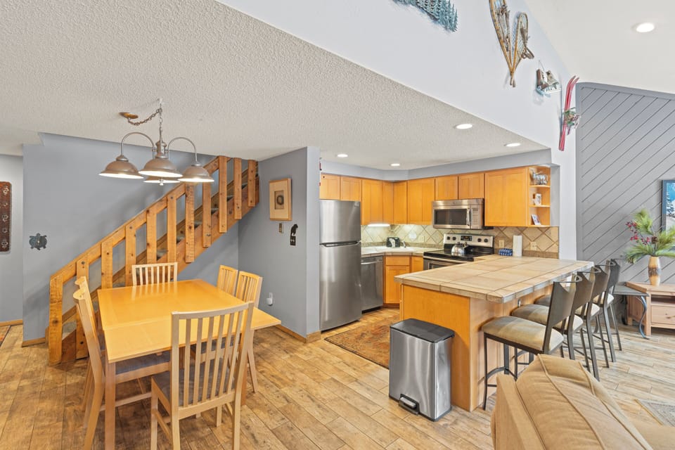 Full kitchen with brand new oven/microwave.  Dining table sits 6. Stairs to loft