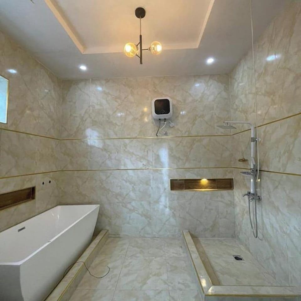 Family Room, Balcony, City View | Bathroom | Free toiletries, hair dryer, towels, soap