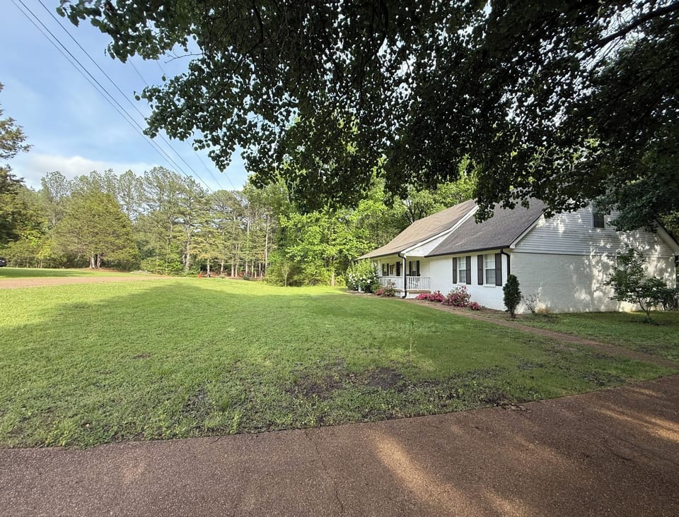 This house has a large driveway for several cars