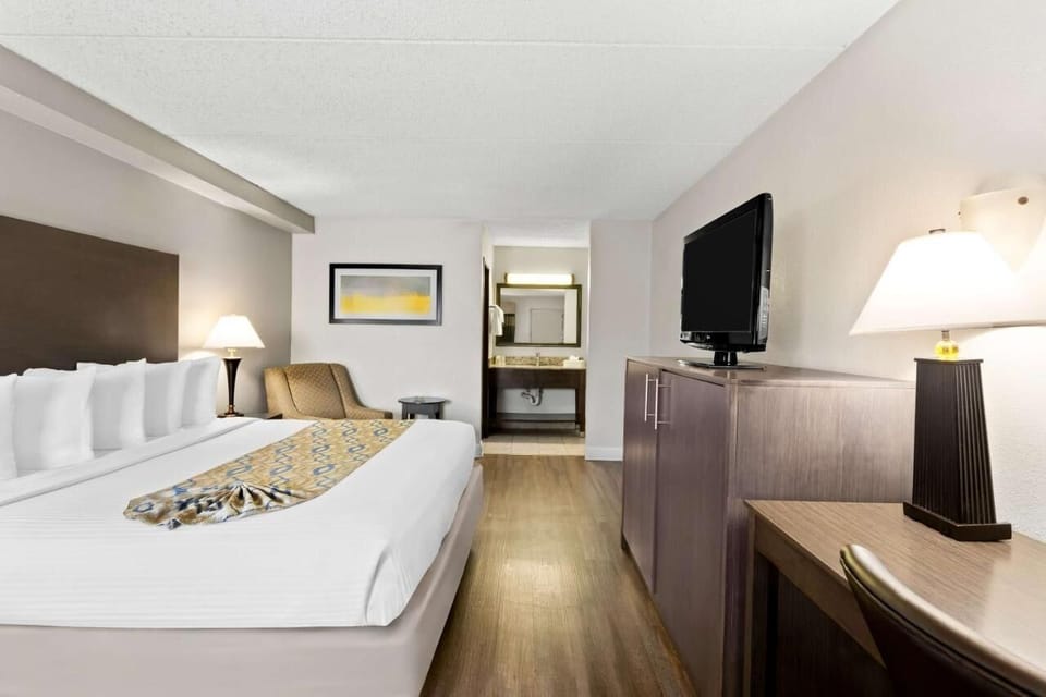 Unwind after adventures with a roomy bed and work desk.