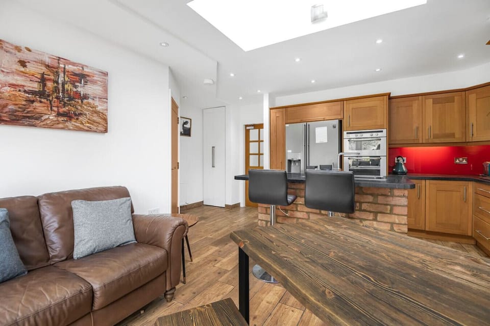 Open-plan kitchen and living space with dining area