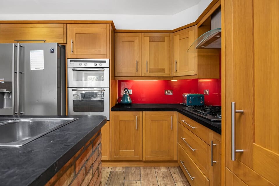 Fully equipped kitchen with modern cabinetry