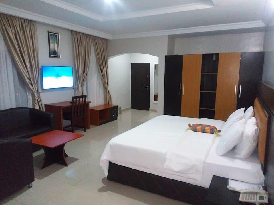 Economy Room, Balcony, City View | Desk, laptop workspace, blackout drapes, soundproofing