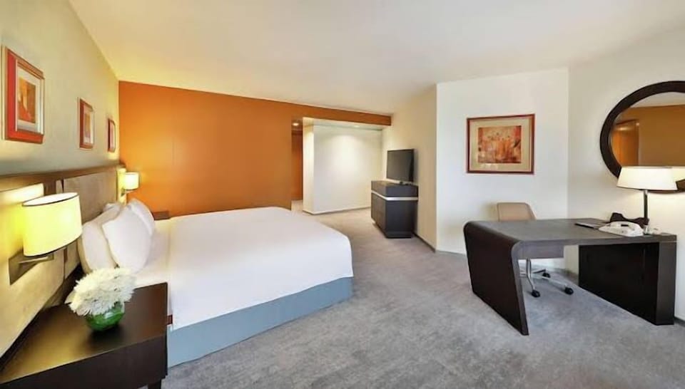 Family Room, Balcony, City View | Desk, laptop workspace, soundproofing, free WiFi
