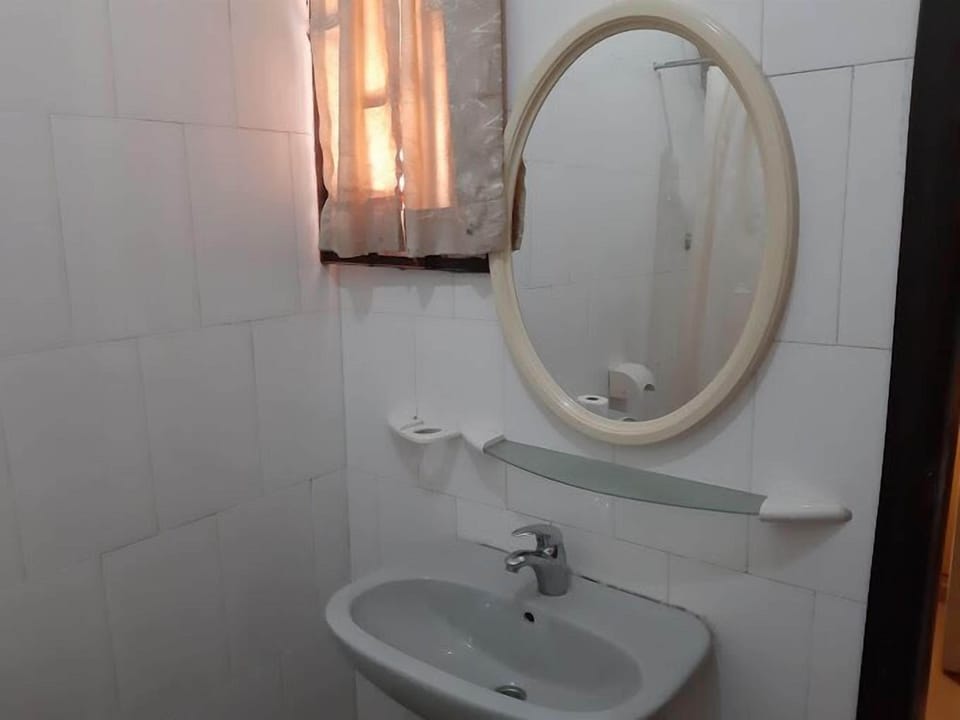 Family Room, Balcony, City View | Bathroom | Free toiletries, hair dryer, towels, soap