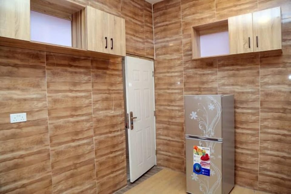 Deluxe Apartment, Balcony, City View | Private kitchen | Fridge, microwave, oven, stovetop