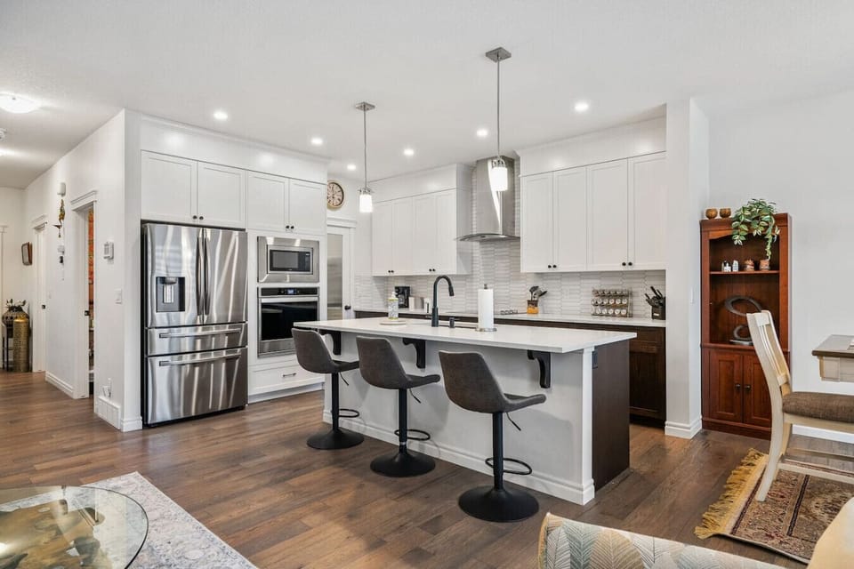 Full kitchen on the main floor with a drip coffee maker & a blender.