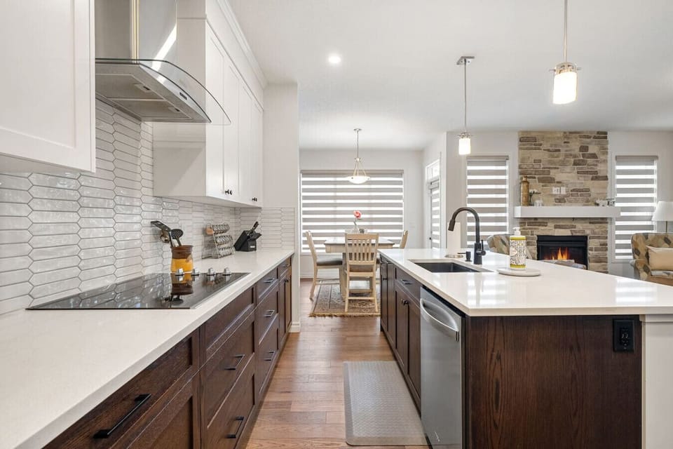 Full kitchen on the main floor with a drip coffee maker & a blender.