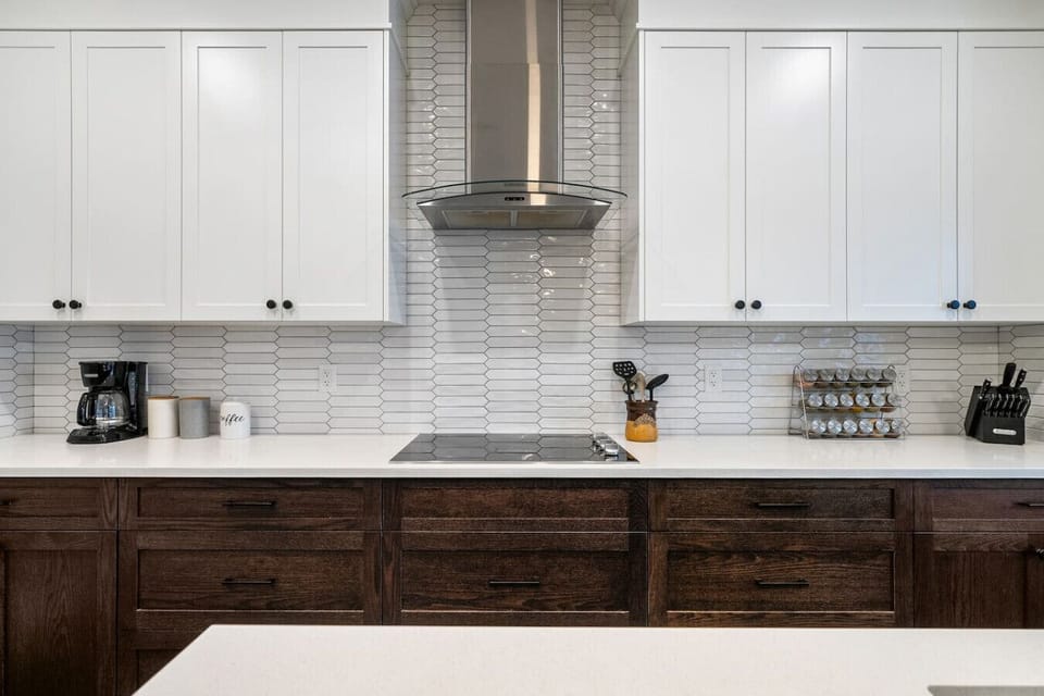 Full kitchen on the main floor with a drip coffee maker & a blender.
