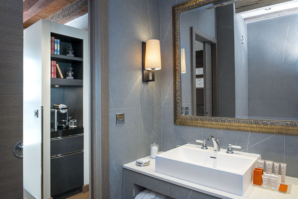 Junior Suite | Bathroom | Rainfall showerhead, designer toiletries, hair dryer, bathrobes