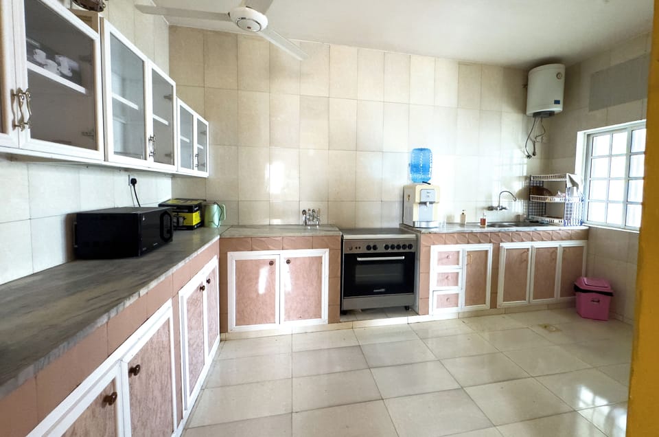Family Villa, Garden View | Private kitchen | Stovetop, electric kettle, highchair