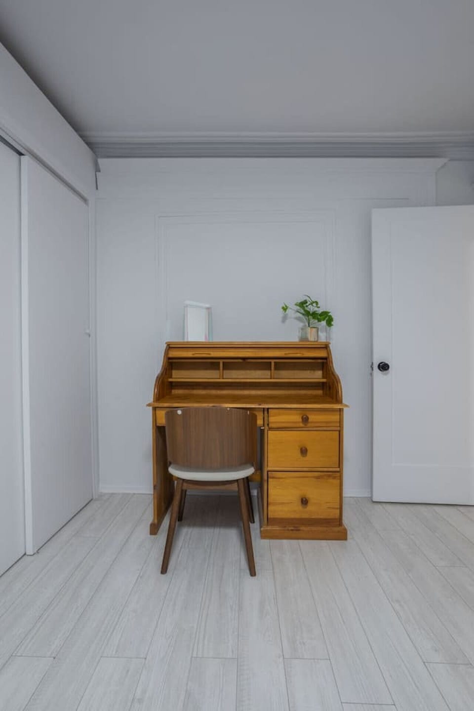 Add a touch of classic charm to your stay with this vintage wooden desk