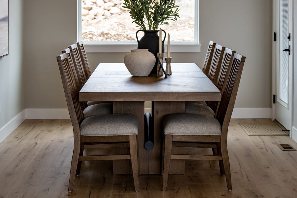 Separate dining area, tucked off the kitchen, a few short steps to the patio, with stunning views of the back yard.