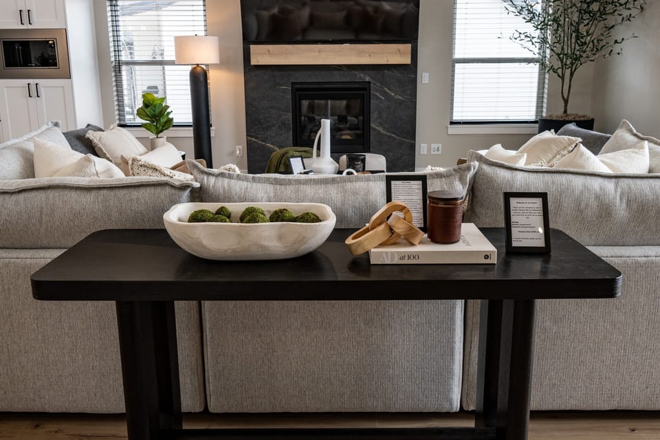 Unwind in the living room by the fireplace after a day's adventure.