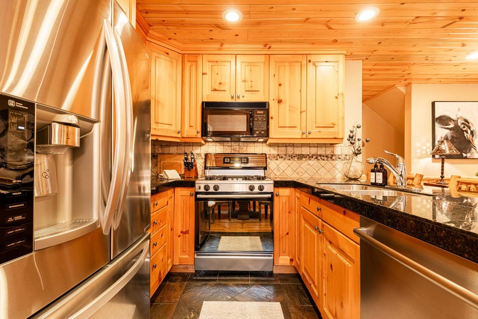 Fully Equipped Kitchen with Stainless Steel Appliances, Gas Range, & Drip Coffee Maker