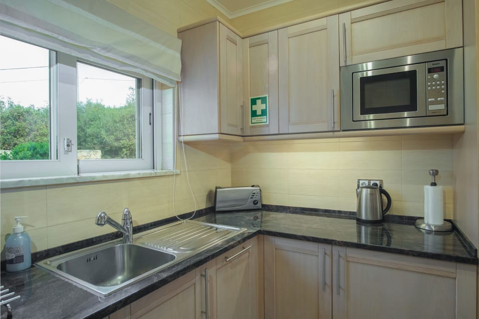 Fitted kitchen with appliances