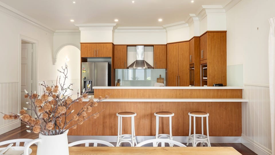 Well-equipped kitchen adjacent to dining area 