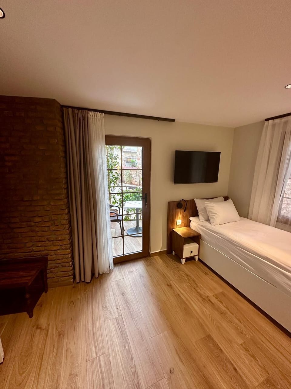 Triple Room, Balcony, Garden View | Balcony view
