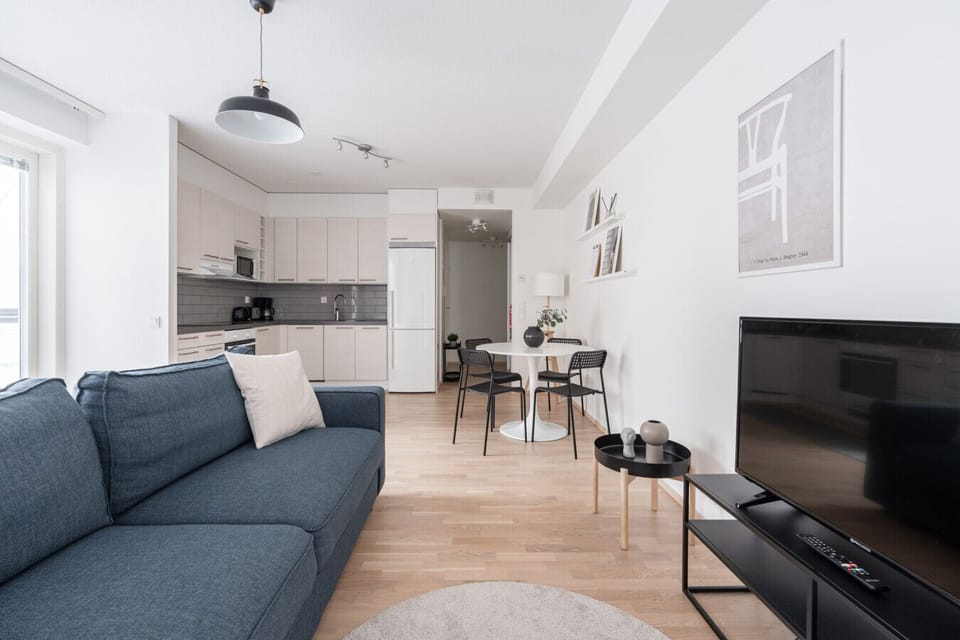 Apartment kitchen, dining area and living room