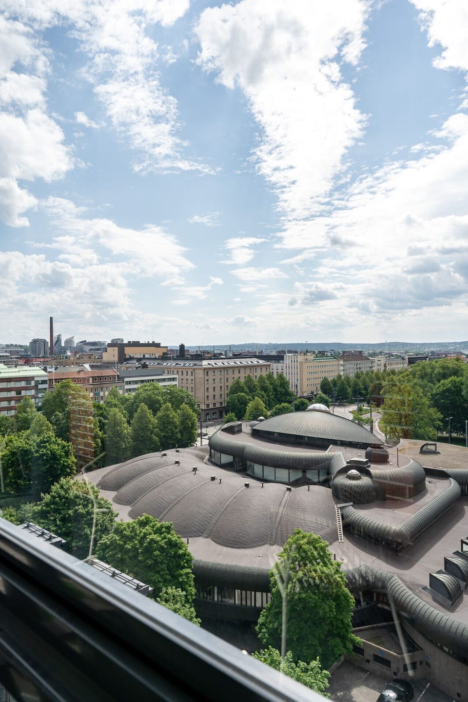 Gaze out at the iconic architecture of the Metso City Library, one of Tampere`s most famous landmarks located just across the street.