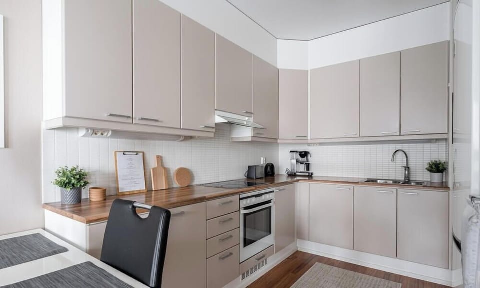 You will find everything needed for home cooking, including a dishwasher, microwave, and high-quality coffee maker.