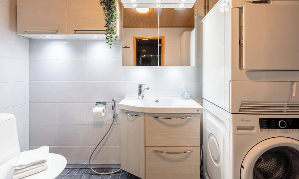 A washing machine and tumble dryer are available inside the apartment, making it ideal for longer stays.