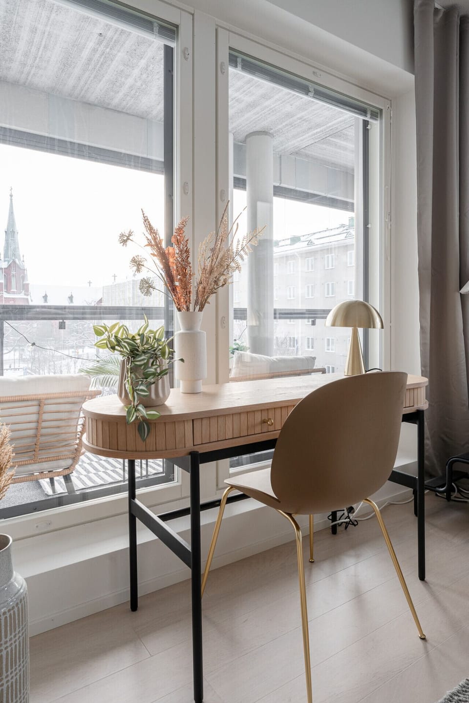 This inspiring workspace offers a peaceful spot for remote work with a direct view of the historic Alexander Church.