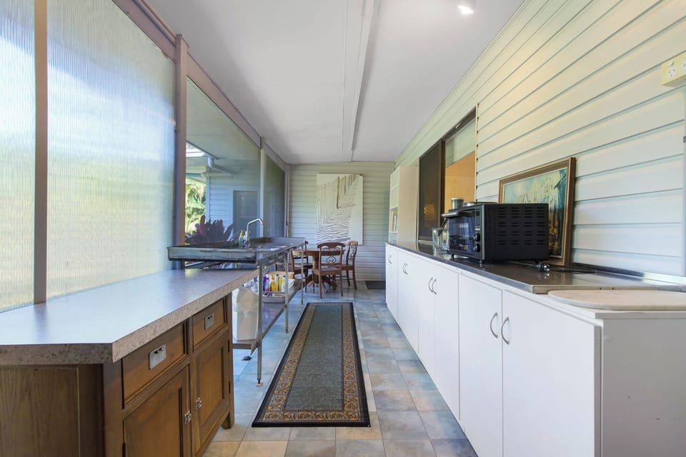 Sunroom with kitchenette view 2
