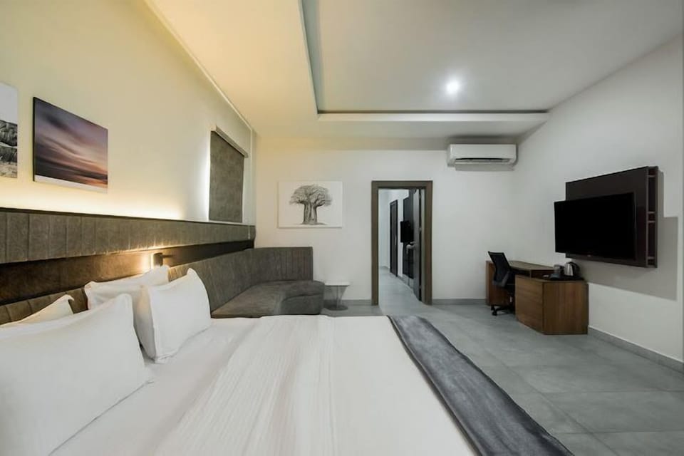 Economy Room, Balcony, City View | Desk, laptop workspace, blackout drapes, soundproofing