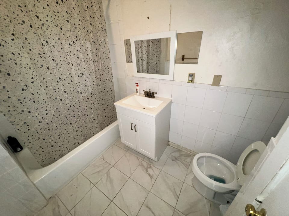 Combined shower/tub, soap, toilet paper