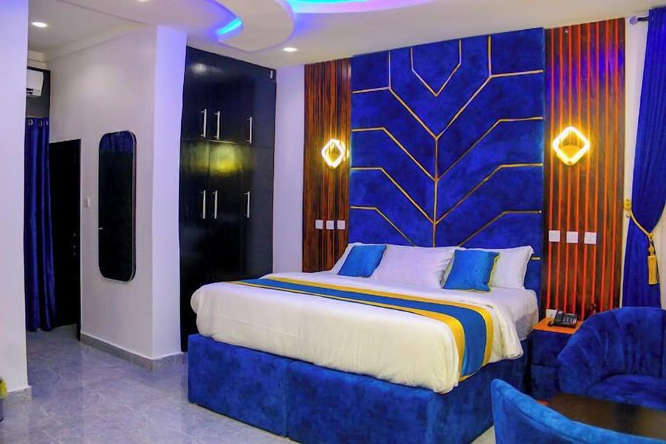 Deluxe Room, Balcony, City View | Desk, laptop workspace, blackout drapes, soundproofing