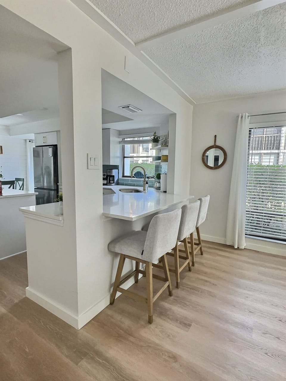 Expanded countertop with sitting.