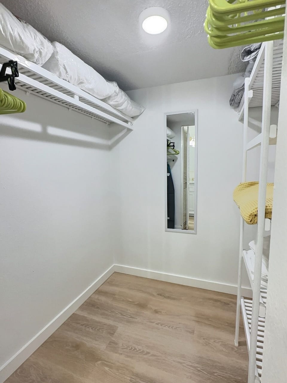 Large walk-in closet in master bedroom.