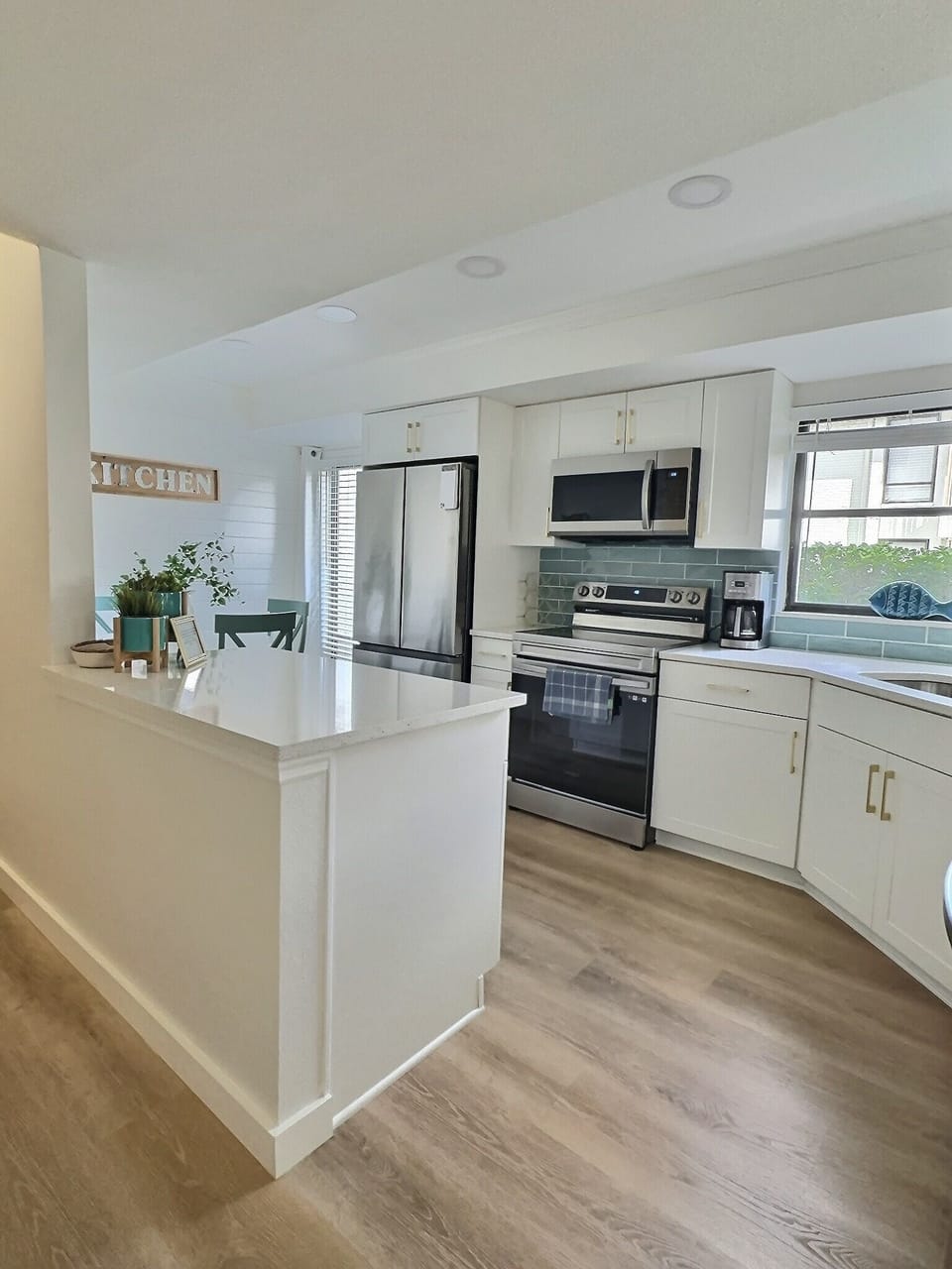New quartz countertops and appliances.  Plenty of light and lots of storage.