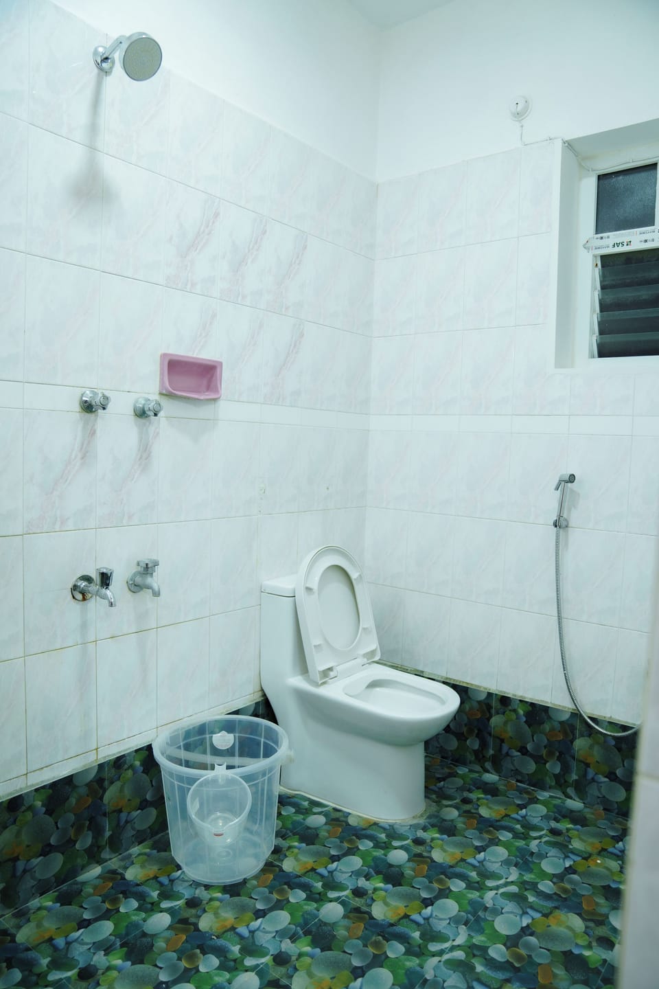 Shower, free toiletries, towels, soap
