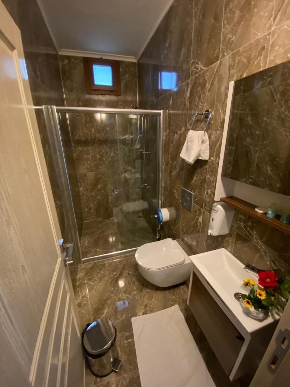 Shower, free toiletries, hair dryer, slippers