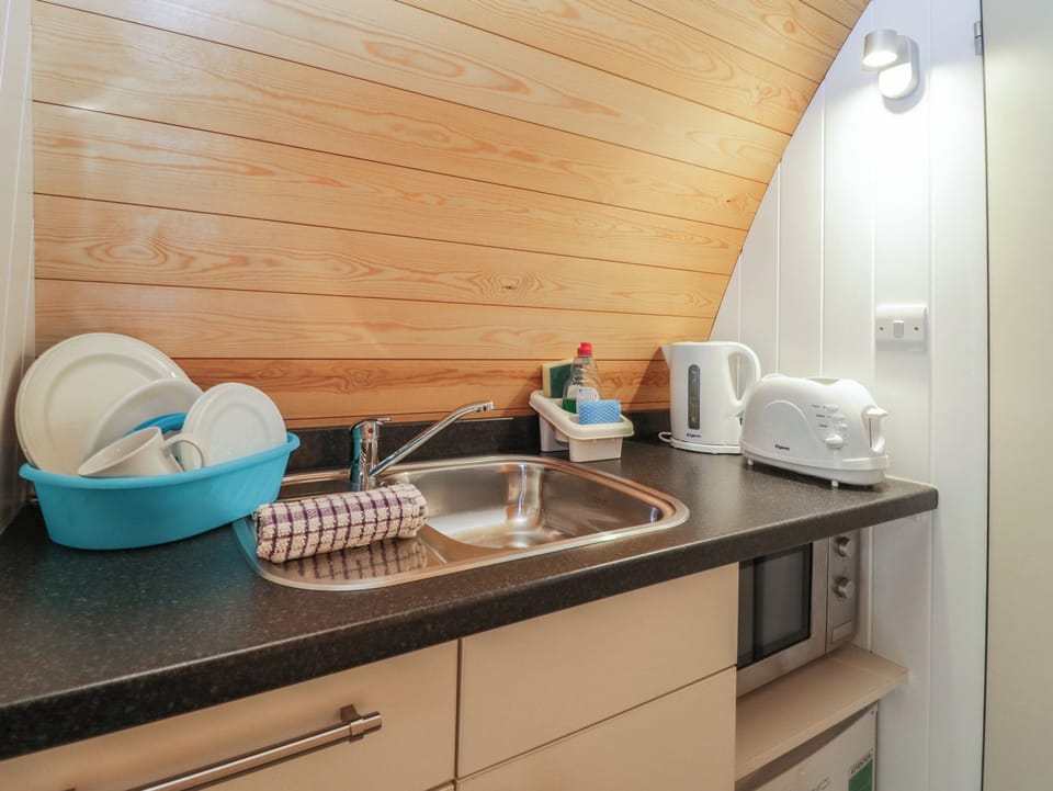 Fridge, electric kettle, toaster, cookware/dishes/utensils