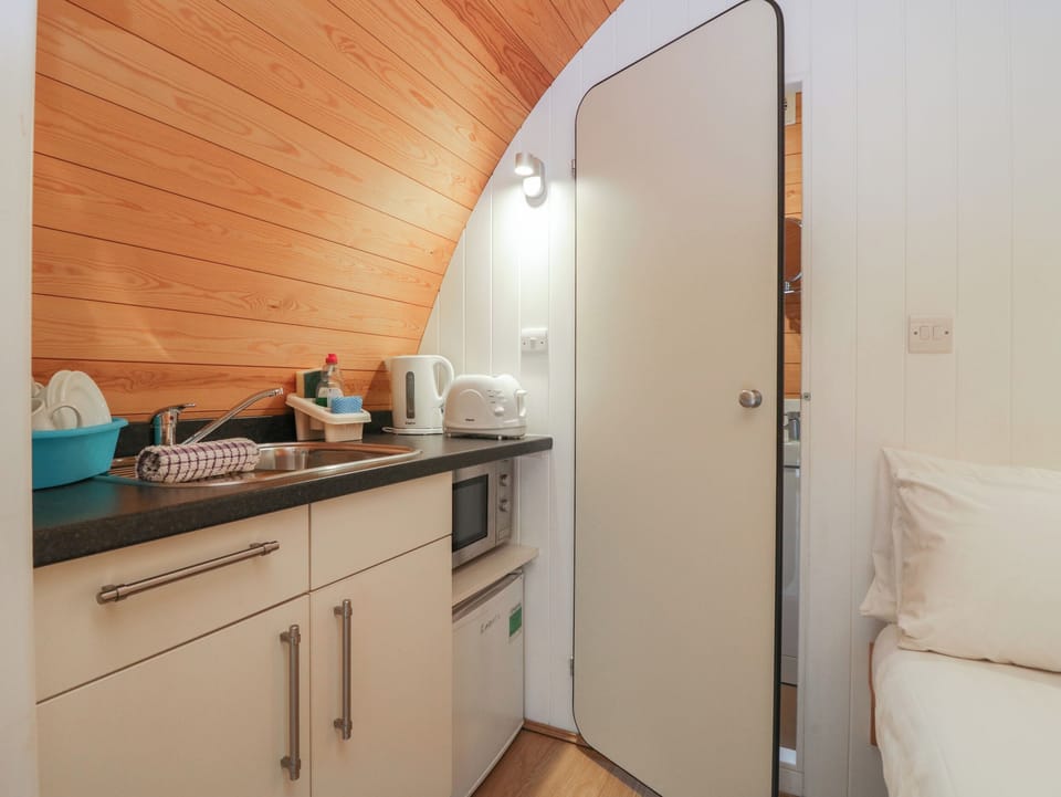 Fridge, electric kettle, toaster, cookware/dishes/utensils