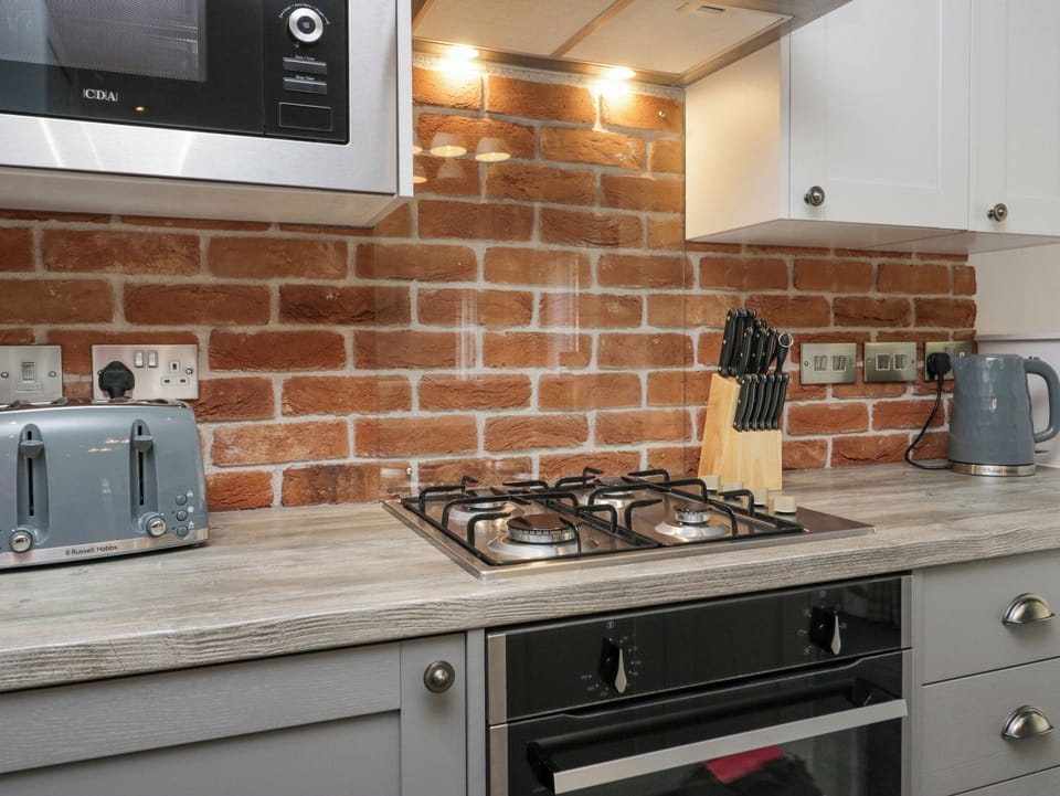 Fridge, dishwasher, electric kettle, toaster