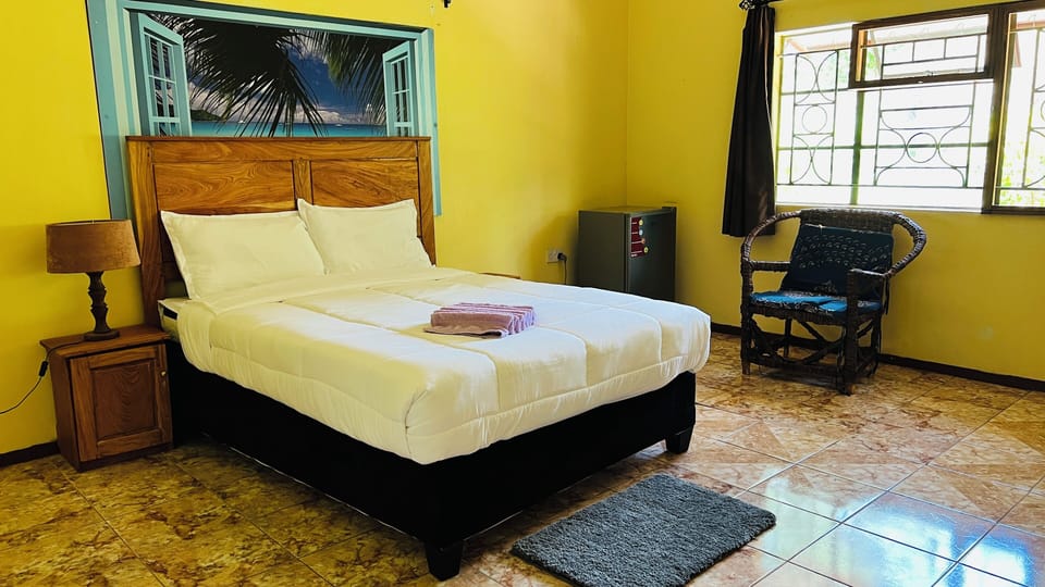 Deluxe Double Room Single Use, Garden View | Desk, laptop workspace, blackout drapes, iron/ironing board