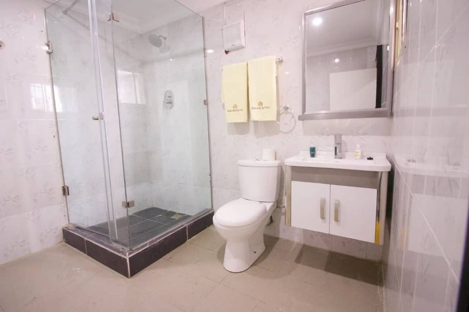 Standard Room, Multiple Beds, Non Smoking, Executive Level | Bathroom | Shower, towels, soap, toilet paper