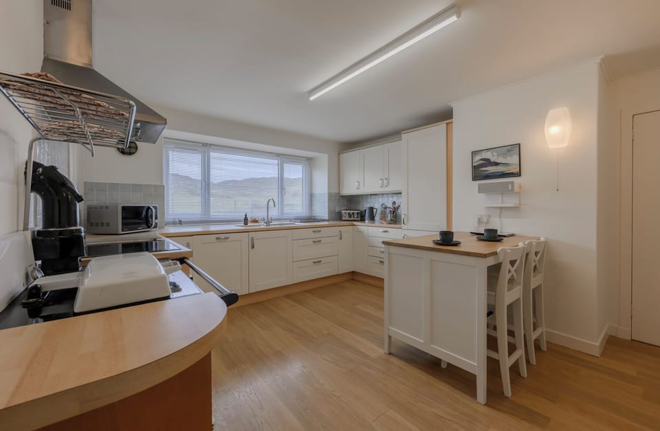 Spacious kitchen with stove, oven, m'wave, range, fridge/freezer and dishwasher.