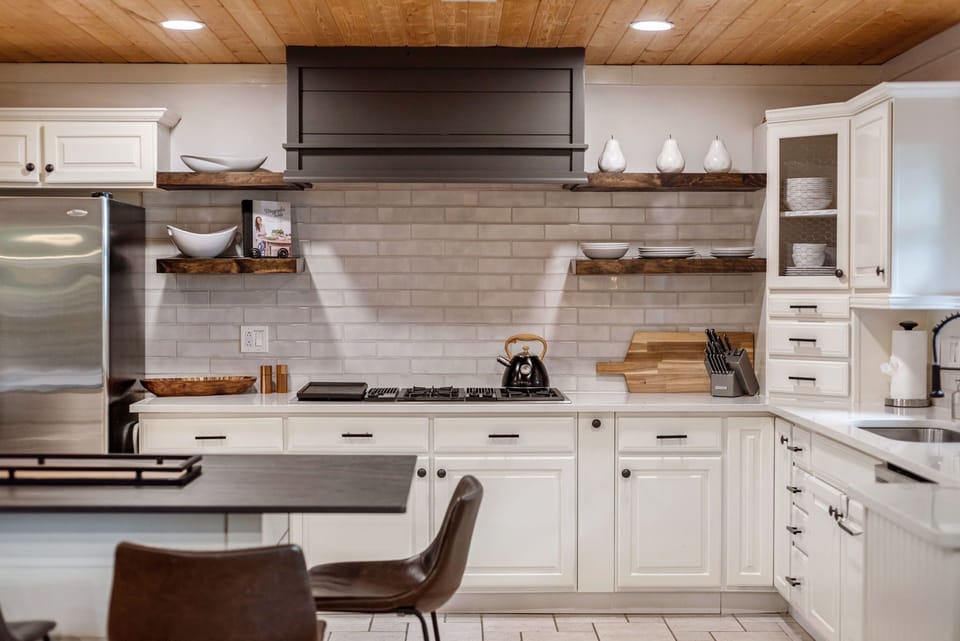Dishes, cookware, gas cooktop, wall oven, spices, condiments and more. 