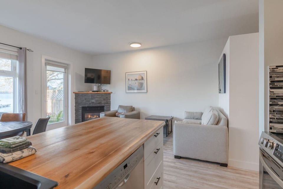 Open concept kitchen/dining/living area with ocean view